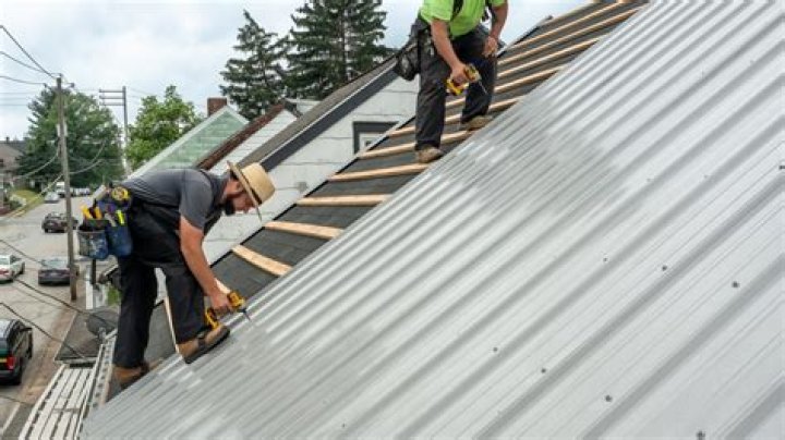 How do you overlap corrugated roofing?
