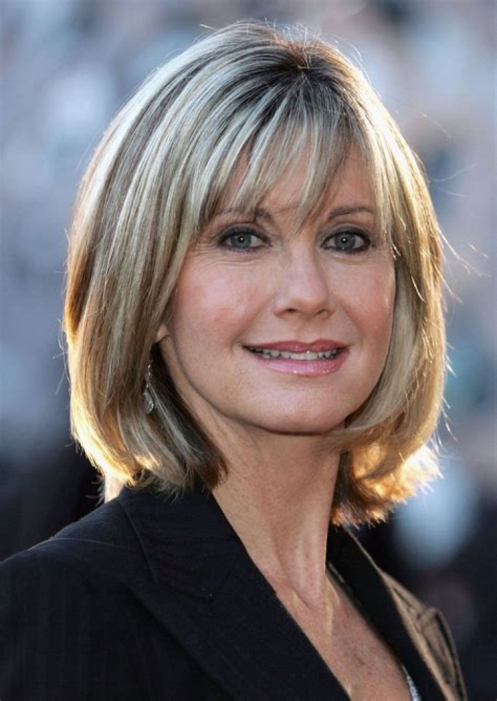 How tall was Olivia Newton John